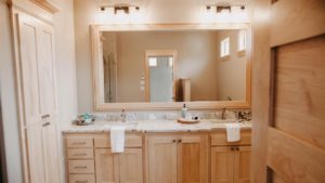master bathroom maple cabinets